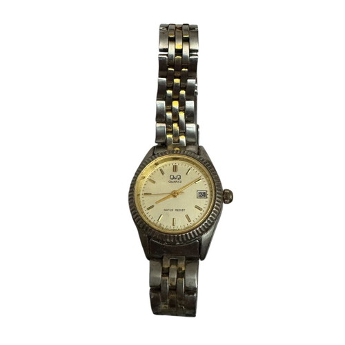 Q&Q Quartz wristwatch women's used, gold and silver
