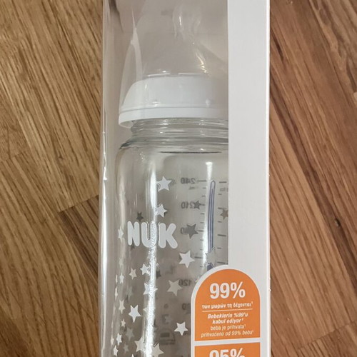 Nuk glass baby bottle and two pacifiers new