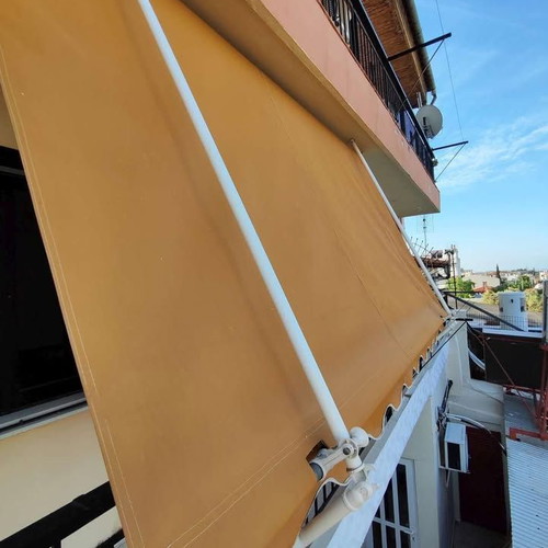 Awnings with orange supports like new, Super Tenta Papandreou fabric