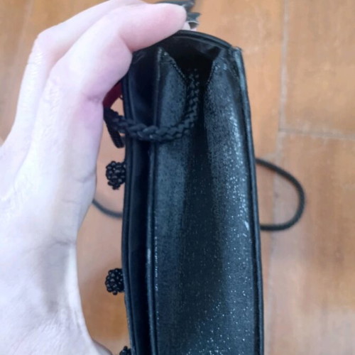 Shoulder bag like new, black with cord and button