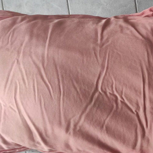 Pillow set used, pack of three large and two small pillows