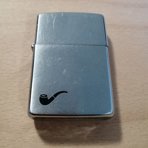 Zippo lighter used with decorative graphic