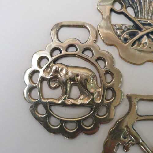Authentic brass horse medallions set of 4 like new