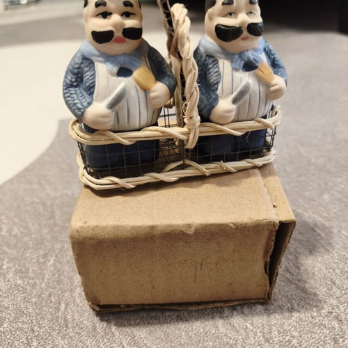 Vintage salt and pepper set with chef figures in wicker basket