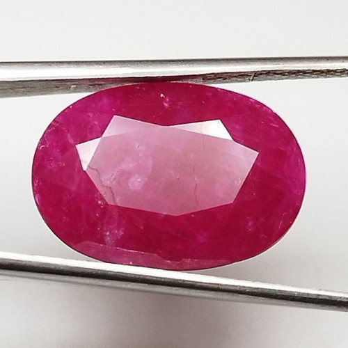 Ruby 10.54 carat hot pinkish red from Mozambique new