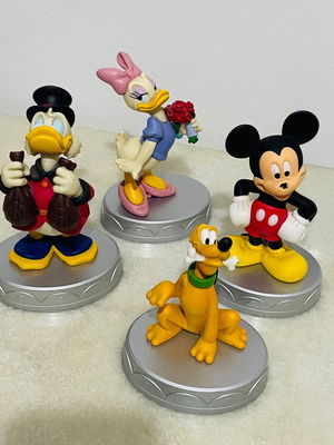 Disney collectible figures set of 4 used