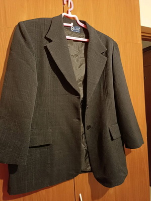 Black jacket used, fits up to large