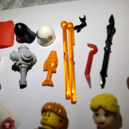 Lego figures, accessories and pieces used, all together