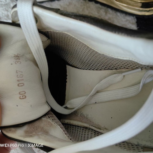 Louis Vuitton sneakers used size 38.5 with visible wear