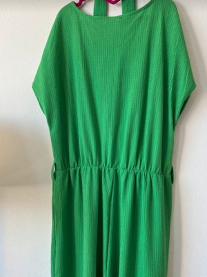 Emerald green one-piece jumpsuit with sleeves and waist belt