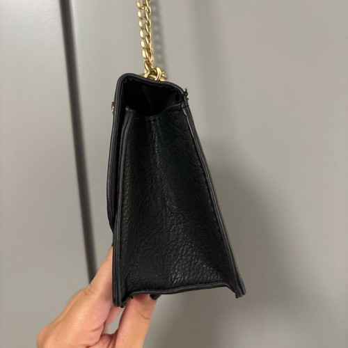 Shoulder bag with gold stars and chain like new, black