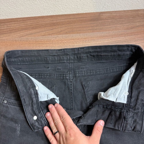 Men's/Unisex black jeans with faded finish like new