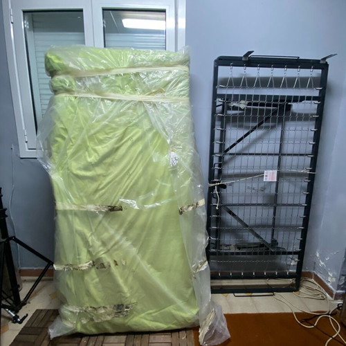 Folding iron bed like new with mattress without springs