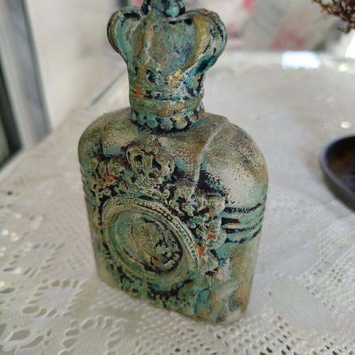 Handmade decorative bottle like new with mixed media and verdigris patina