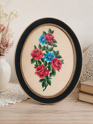 Vintage handmade cross-stitch frame with velvet oval border used