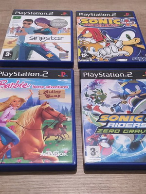 PlayStation 2 games used collection including Singstar and Sonic