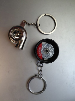 Brelock turbo and rim keychains like new with Brembo