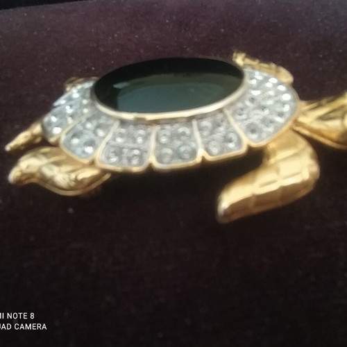 Turtle vintage brooch with large green emerald-like stone, like new