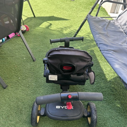 Byox tricycle like new with sunshade and foldable design
