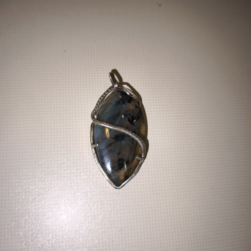 Opal pendant with silver used, snake shape