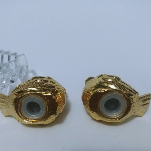 Set of gilded miniature salt and pepper shakers with lead tray