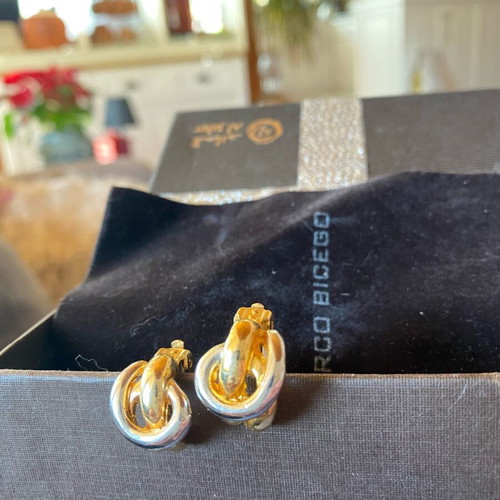Clip-on earrings like new, silver-gold two-tone knot design