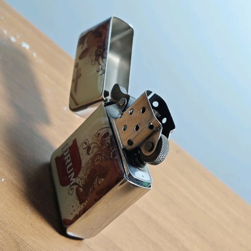Drum promotional lighter used, functional, collectible