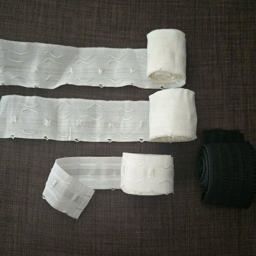 Curtain tapes and wide black elastic like new