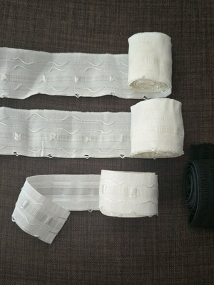 Curtain tapes and wide black elastic like new