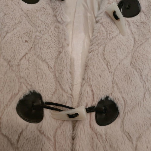 Fur vest used, pale pink with ethnic details, size L