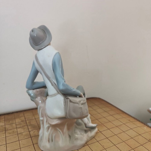 Lladró Boy with Dog porcelain figure refurbished