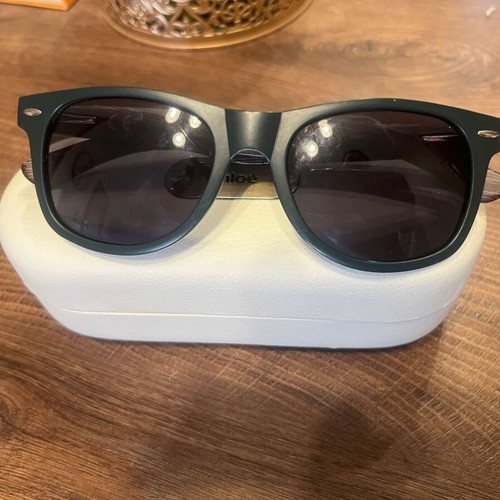 Jägermeister collectible sunglasses with bamboo arms, dark green frame