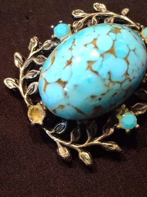 Vintage brooch from the 60s with one small missing stone