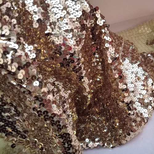 Stable fabric with gold sequins used