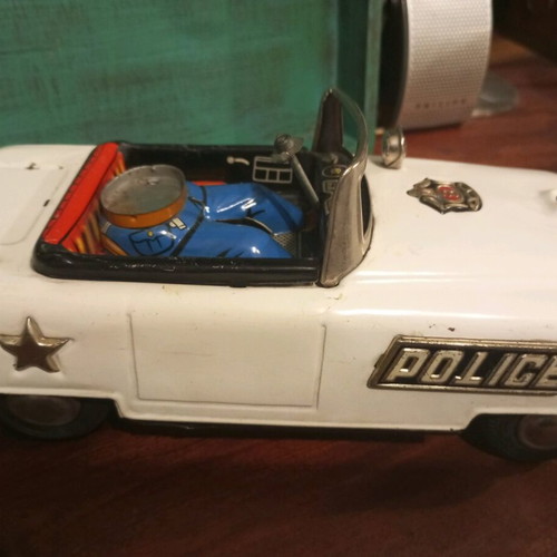 Old tin toy car for spare parts