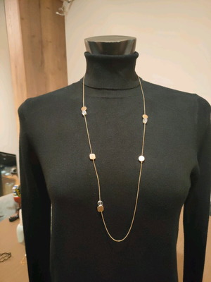 Long necklace like new, gold color with subtle details