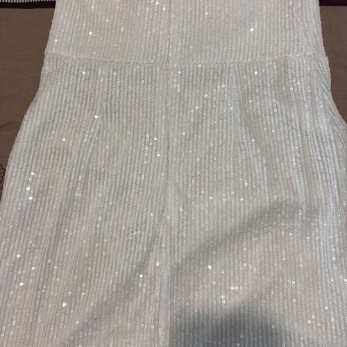 Strapless mini dress used, white with feathers