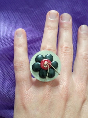 Handmade ring used with flower, blue and silver
