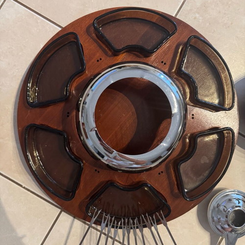Fondue set like new with wooden base and 11 forks