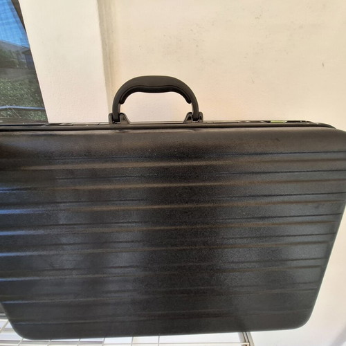 Pilot suitcase used, black polycarbonate travel accessory