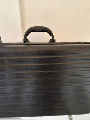 Pilot suitcase used, black polycarbonate travel accessory