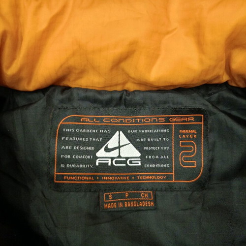 Nike ACG Retro Puffer Vest used, orange and black, size S