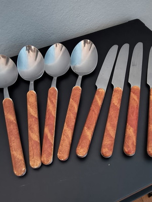 Cutlery set used, 4 spoons and 4 knives