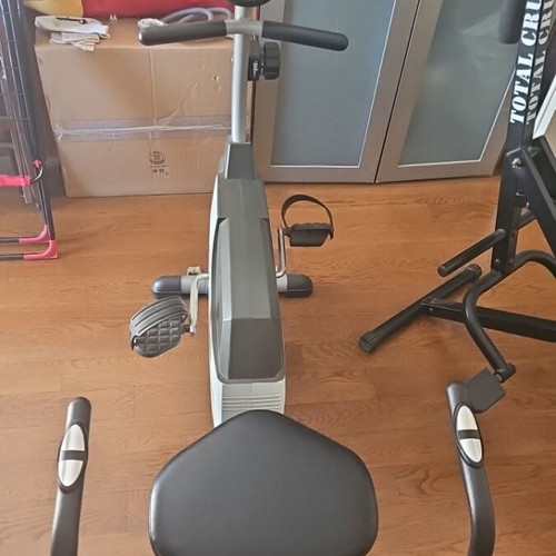 X-Fit stationary bike used with time and calorie counter
