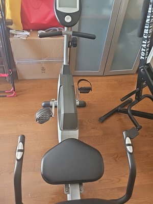 X-Fit stationary bike used with time and calorie counter