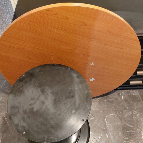 Round wooden table with black metal base like new