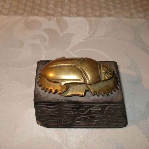 Egyptian bronze decorative scarab used with black hieroglyph base
