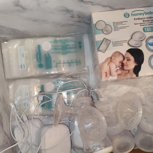 Breastfeeding set with pumps and accessories like new