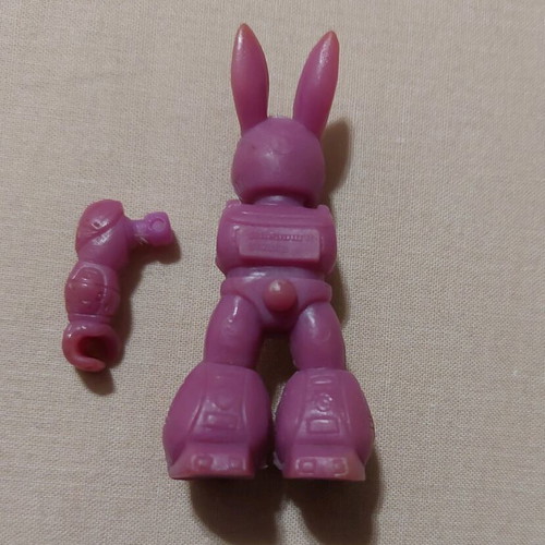 Teratomachos purple rabbit figure used with one arm