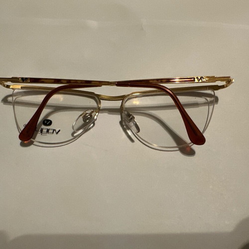 Oval Vogue optical glasses with tortoise details and gold frame, new